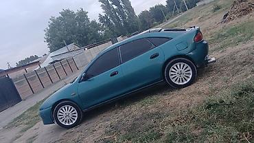 cx 9: Mazda Lantis: 1995 г., 1.5 л, Механика, Бензин, Хэтчбэк — 1
