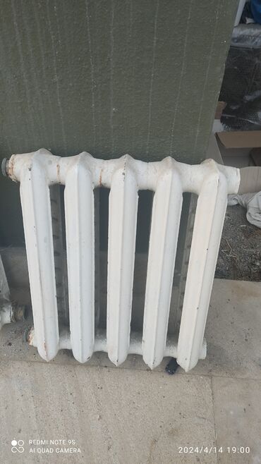 tap az radiatorlar: İşlənmiş Panel Radiator IDEAL, Çuqun