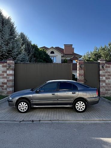сколько стоит коврик: Mitsubishi Carisma: 2003 г., Механика, Дизель, Седан — 7