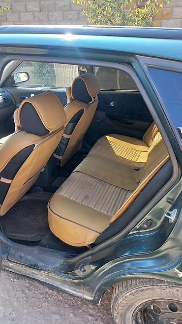 demio sport: Mazda 323: 2000 г., 1.6 л, Механика, Бензин, Лифтбек — 10