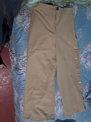 nike şalvar: Bej rəngli qadın şalvarı - Model: Geniş kəsim, düz balaq - Material — 2
