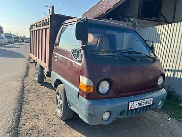 porter 3: Hyundai Porter, 2006 г. Грузовой, бортовой. Цвет: красный. Правый — 2