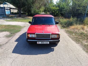купить фары на ниву: Продается красный седан Lada 2107. Автомобиль оснащен тонированными