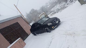 Kia: Kia Rio: 1.4 l | 2010 il Sedan — 11