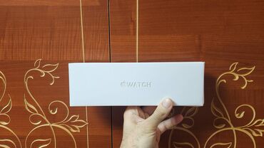 Smart saatlar: Apple Watch 10 42mm Rose Gold with Light Blush Sport Band. Yeni və