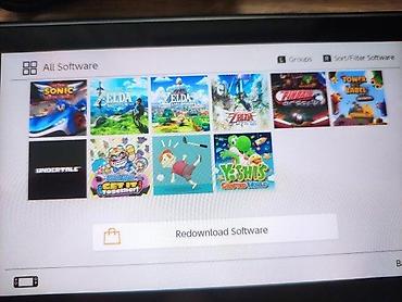 Nintendo Switch: 🔥 JEDINSTVENA PONUDA! Prodajem Nintendo Switch 32GB + microSD 400GB — 12