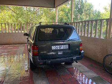 Jeep: Jeep Grand Cherokee (ZJ), tünd yaşıl rəng, V8 mühərrik. Texniki və — 4