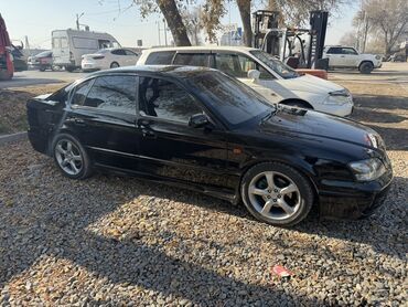 купить резину на ниву: Черный седан среднего класса с правым рулем. Особенности и оснащение