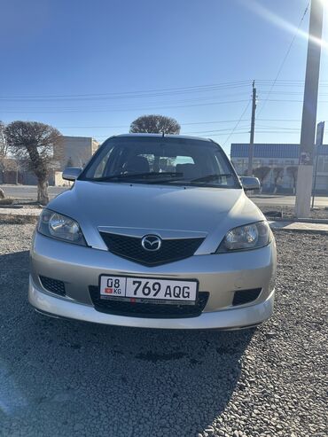 уста машина: Mazda Demio: 2004 г., 1.3 л, Автомат, Бензин, Хэтчбэк