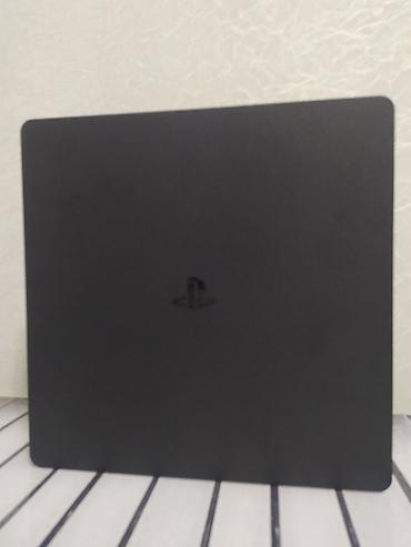 Видеоигры и приставки: PlayStation 4 Slim oyun konsolu Xüsusiyyətlər: - Rəng: qara, mat — 2