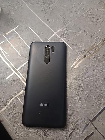 Redmi: Redmi smartfon - Model: Redmi (arxa qapaqda Redmi loqosu) - Rəng — 2