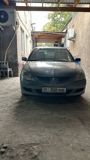 mitsubishi fto: Mitsubishi Lancer: 2005 г., 1.6 л, Автомат, Газ, Седан