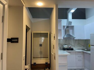 Uzunmüddətli kirayə mənzillər: Elit ticarət mərkəzi Yuxa Restoranının arxasında 16 mərtəbəli binanın — 7