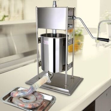 tost makinesi: Kolbasa sosiska dolduran makina. Bu maşınlar paslanmayan poladdan