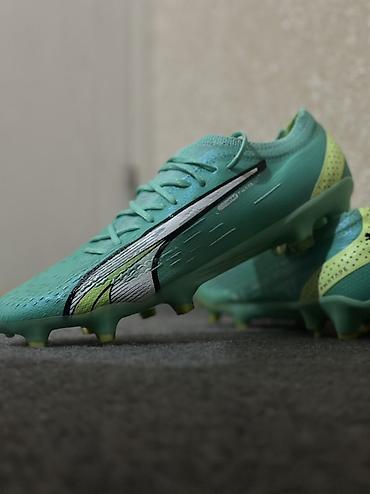 Butslar: Puma futbol butsası – sürət və yüngüllük üçün. - Model: Puma Ultra — 1