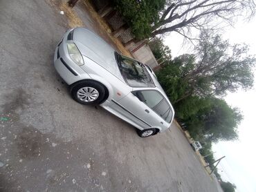 Mazda: Mazda 323: 2000 г., 1.5 л, Механика, Бензин, Хэтчбэк
