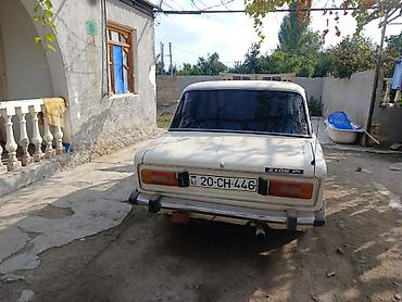 vaz susə: VAZ 2106 (Жигули) sedan - Kuzov: 4 qapılı sedan, açıq-bej rəng. Arxa — 1