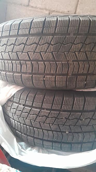 щетка для машины от снега: Зимние шины Bridgestone Blizzak - Размеры: 215/60 R16 99H XL и 195/65 — 2