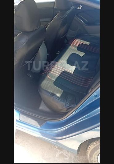 scooter satılık: Kia Cerato sedan – mavi rəng. taksi sertifikati var 2005 masinim var — 4
