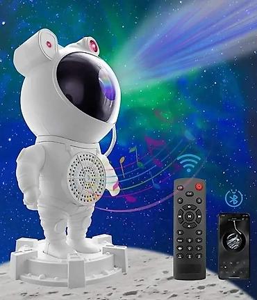 strom co2: Lampa i projektor Star Lights - Astronaut sa zvucnikom. Materijal — 1