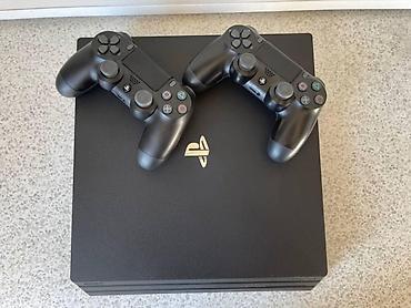 Продаю ps4 про прошитый 1000 гб 18 игр внутри 2 джойстика один