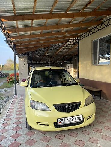 декалб уран: Mazda Demio: 2003 г., Хэтчбэк — 2