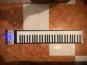 Musiqi alətləri: Piano 
1 dene knopka iwlemir
Hem batareya hem adapter — 2