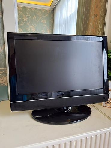LCD televizor, stolüstü dayaqla - Ekran: təxminən 24–27 düym