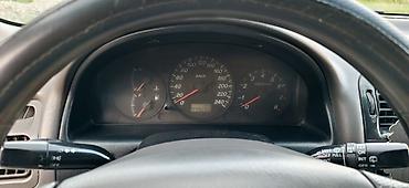 чехол на мопед: Mazda 626: 2000 г., 2 л, Механика, Бензин, Хэтчбэк — 9