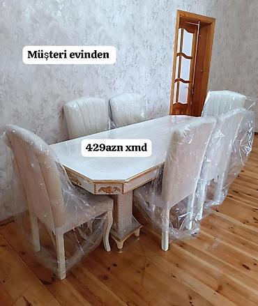 Masa və oturacaq dəstləri: Mebel dəsti – masa və 6 stul - Klassik üslubda, ağ-krem rəngli masa; — 2