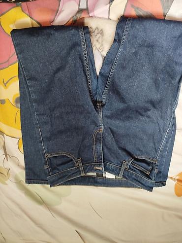 Джинсы: Джинсы классического кроя из плотного денима темно‑синего цвета. - — 4