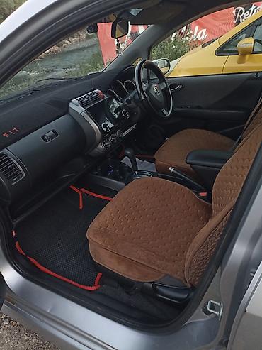 голф 2салон: Honda Fit: 2003 г., 1.3 л, Вариатор, Бензин, Хэтчбэк — 7