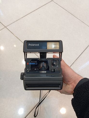 звонок для телефона fly: Fotokameralar