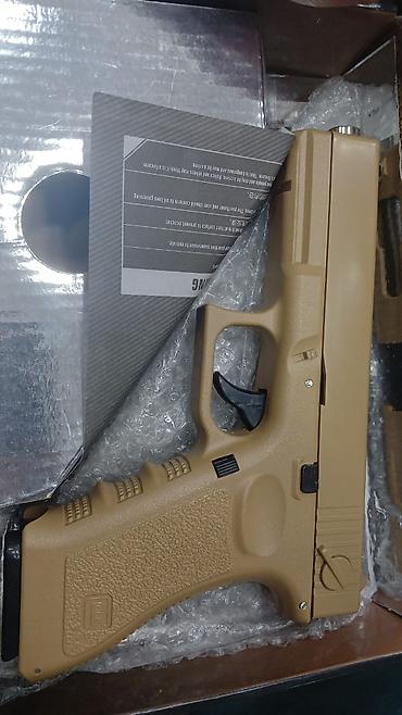 kicik qara don: Məhsul: Airsoft tapança (6 mm BB) Təsvir: - Qutu üzərində “GLOCK” — 1