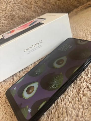 Mobil telefonlar: Xiaomi 12, rəng - Qara, 
 İki sim kartlı — 1