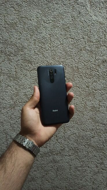telefon flai 100: Xiaomi Redmi 9, 32 ГБ, цвет - Серый, 
 Кнопочный, Отпечаток пальца, Две SIM карты