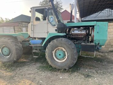 Aş qazanı: Kənd təsərrüfatı traktoru – iri təkərli, dörd təkərdən dartmalı tip