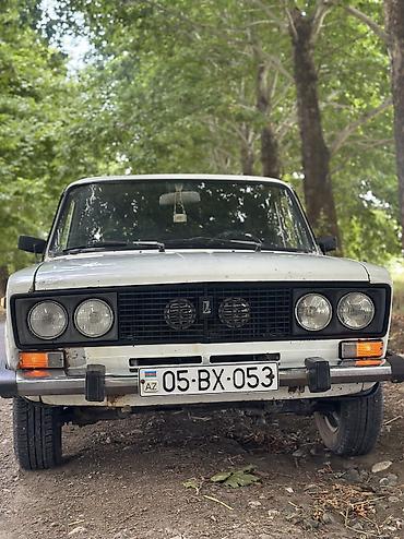 yan güzgülər s: VAZ 2106 sedan – klassik sovet modeli, ağ rəng. Karopka 4 işləy — 4