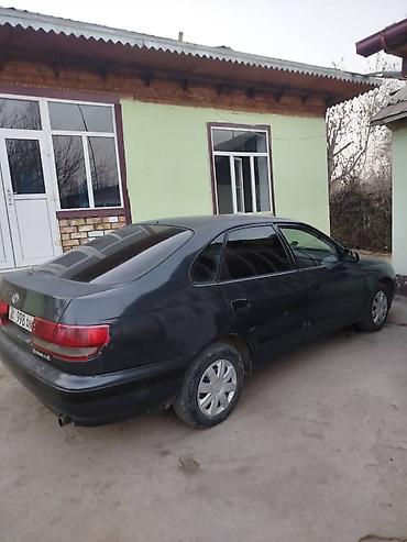 тико карапка: Toyota Carina E: 1994 г., Механика, Бензин, Седан — 4