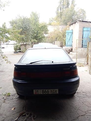Скупка авто: Mazda 323F, хэтчбек 5 дв., темно‑синий цвет, на разбор. - Кузов: 323F — 4