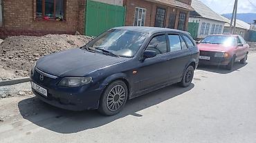 форт грзовой: Mazda 323: 2002 г., 1.6 л, Механика, Бензин, Хэтчбэк — 7