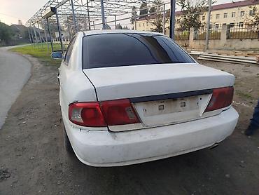 ford motorları: Kia Magentis: 2 l | 2004 il Sedan — 2