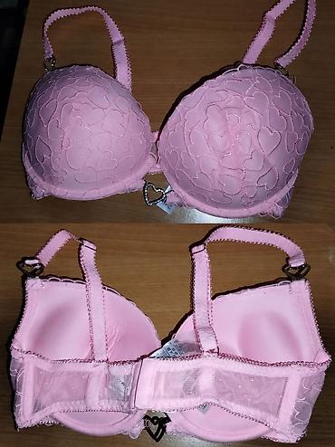 legend outlet haljine: Prelep roze brus sa motivom srca i elegantnim detaljem u obliku srca — 1