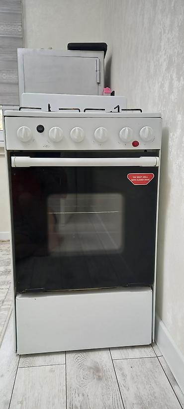 60: Газо-электрическая плита 50×60 см с духовкой. Особенности: - Варочная — 1