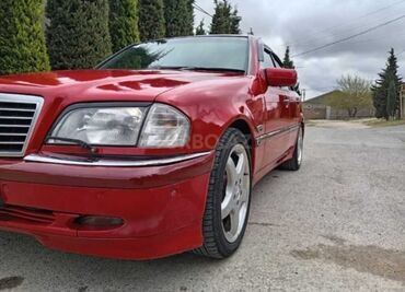 Mercedes-Benz: Mercedes-Benz C‑Class (W202) sedan, qırmızı rəng. - Kuzov: 4 qapılı — 17