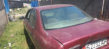 тунуке бу: Nissan Primera: 1994 г. — 2