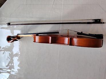 Skripkalar: Skripka dəsti Tərkib: - Tam ölçülü klassik skripka (4/4) - Yay - — 6