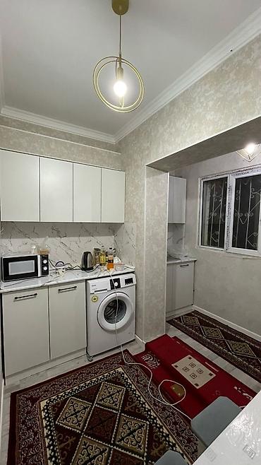 106: 2 комнаты, 63 м², 12 мкр 105 серия, 1 этаж — 7