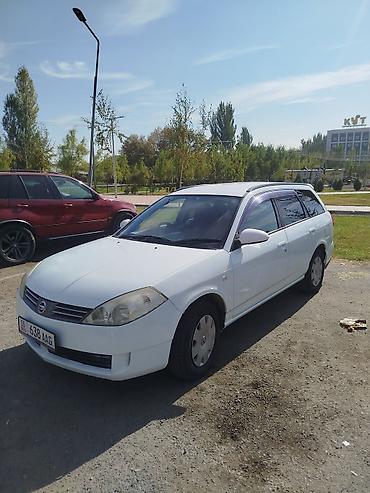 bid машина: Nissan Wingroad: 2004 г., Автомат, Бензин, Универсал — 1