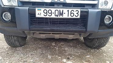 Mitsubishi: Mitsubishi Pajero (GLS) SUV - Kuzov: qara rəng, 5 qapı, yan — 12